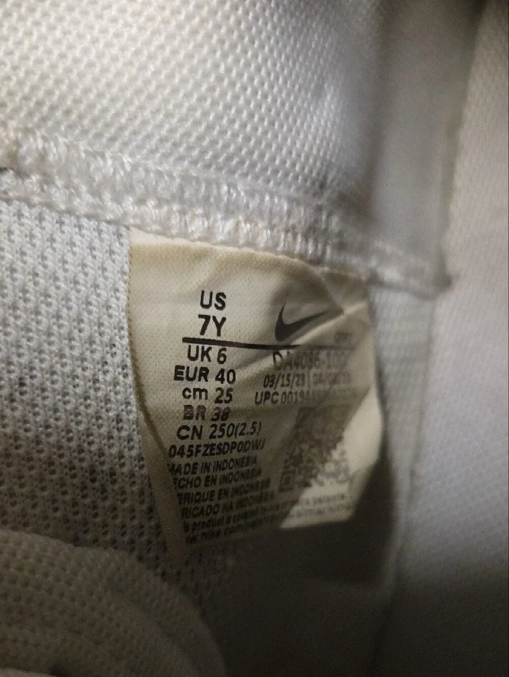 Nike Kids White High-Top Sneakers with Black Swoosh